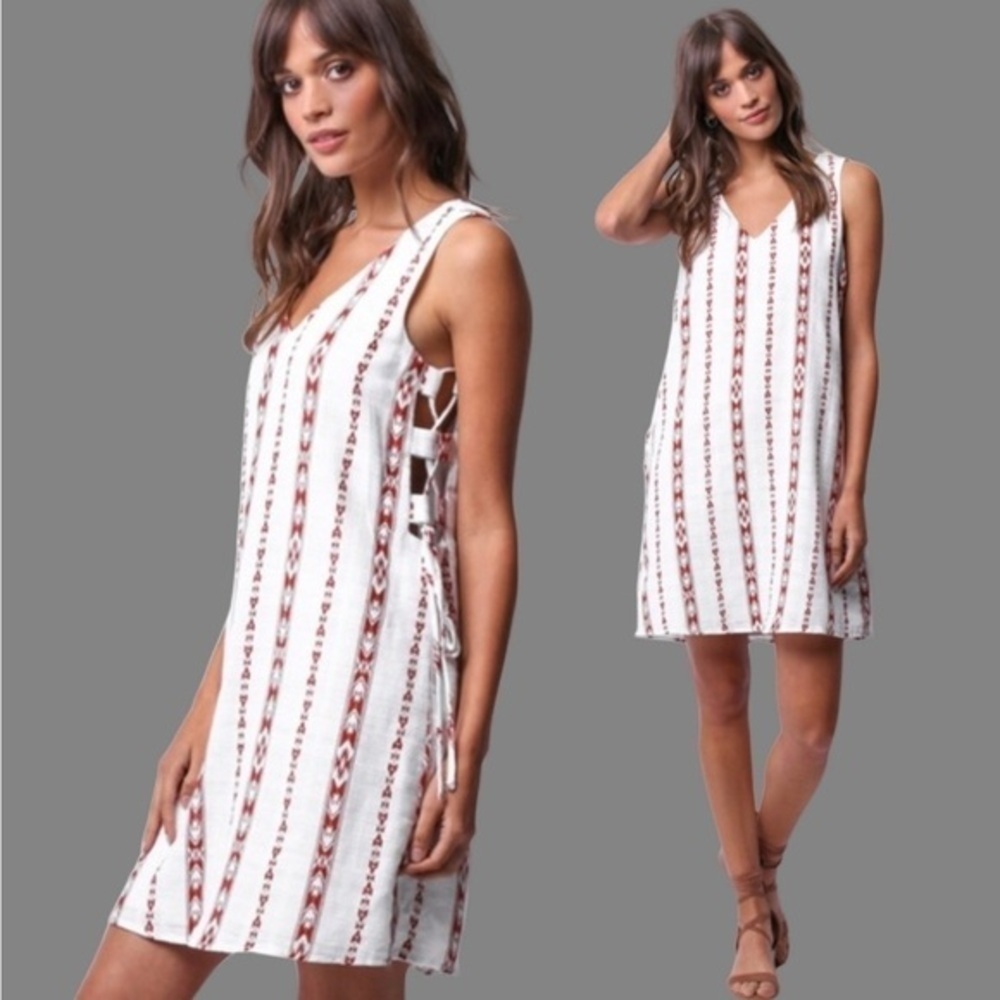 ETHEREAL white with vertical tribal print stripes and side lace ups mini dress